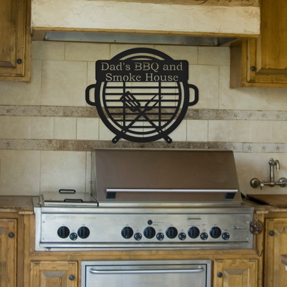 Personalized metal sign that is a grill sign. It is hanging on the outdoor kitchen grill.