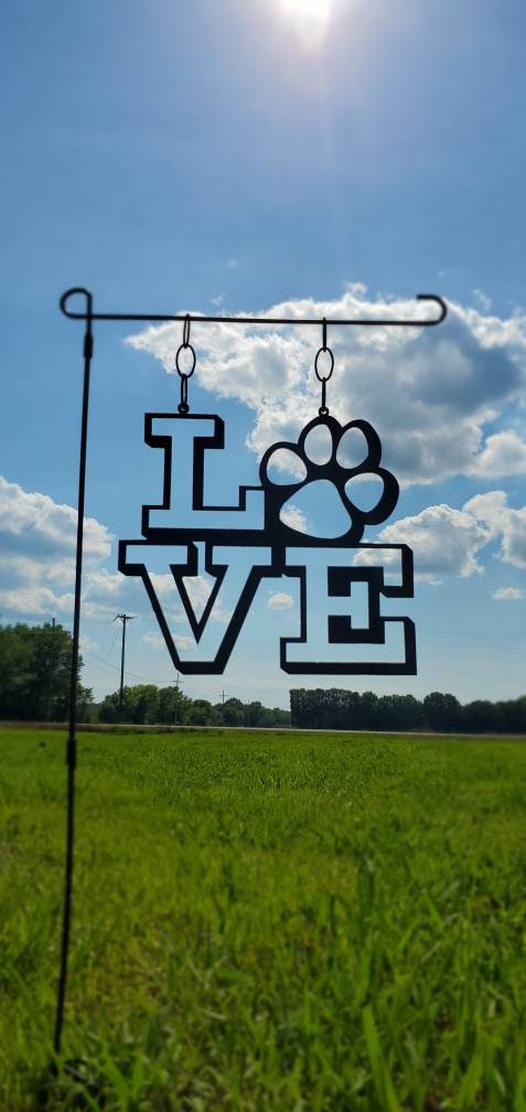 Paw Print metal sign that is a garden flag and makes great yard art!