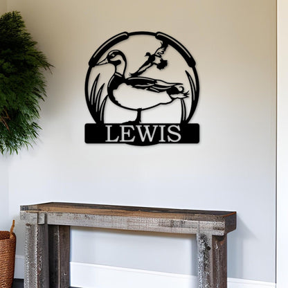 Round custom metal sign that has a 2 ducks in the middle and a space for your own wording.