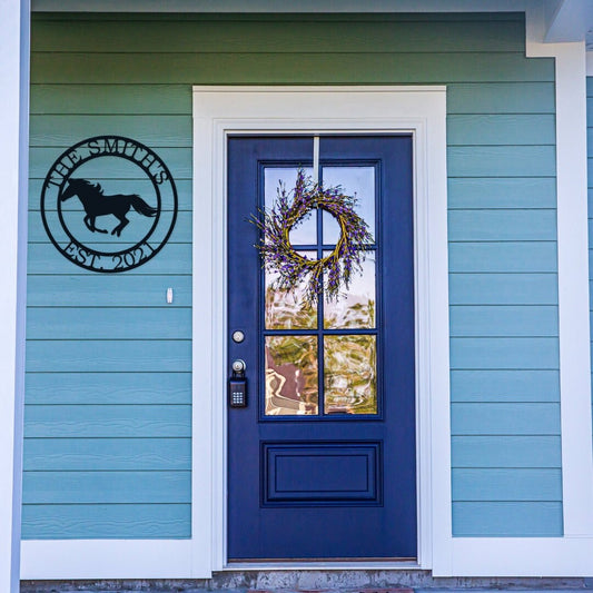 Round metal sign that is personalized for you! It has a horse in the middle and then you can add your wording around the circle. It is hanging on the front porch by the front door.